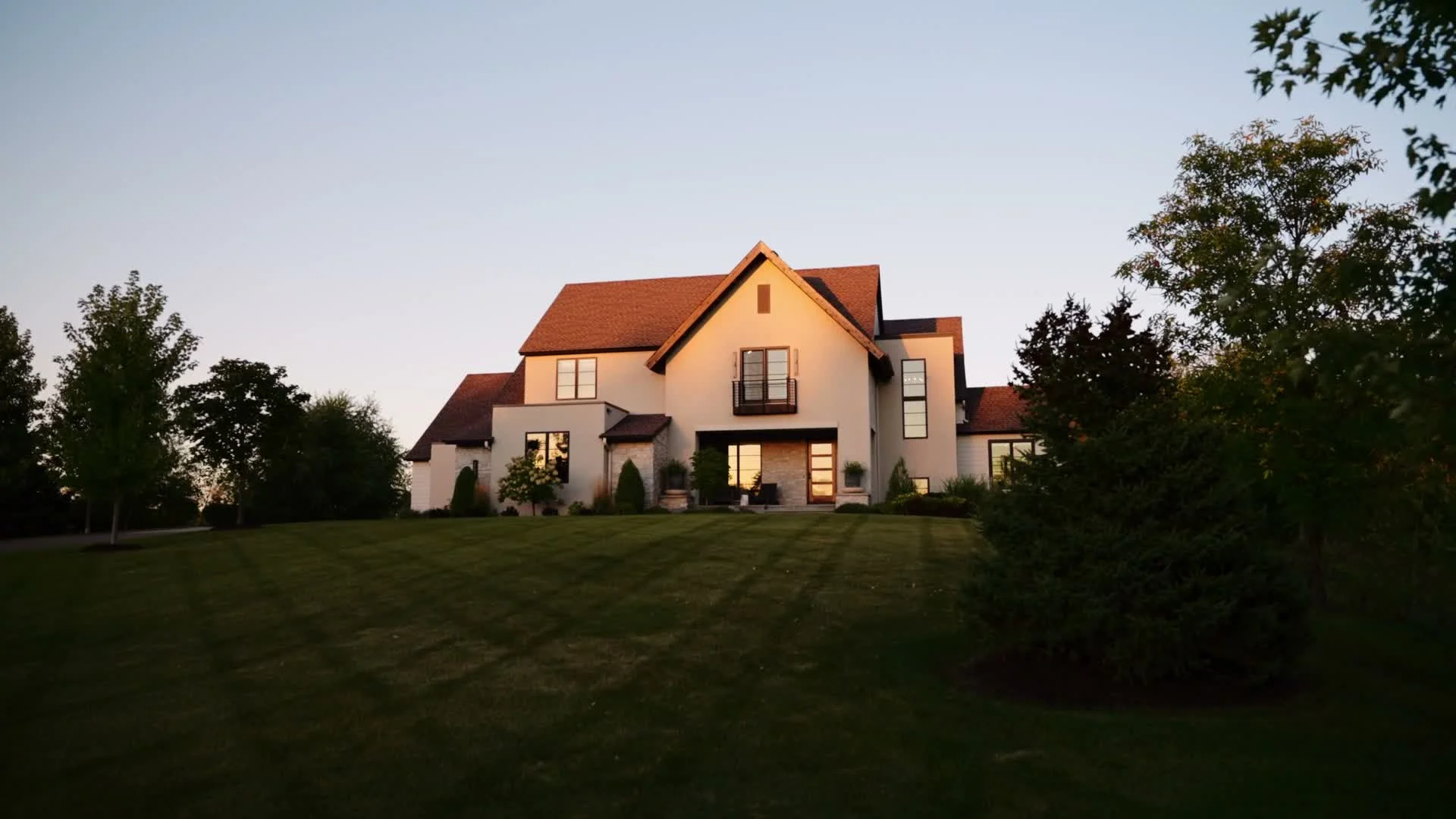 A home exterior at sunrise, used as lifestyle imagery