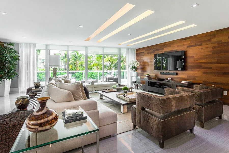 A bright living room with natural light and carefully arranged furniture