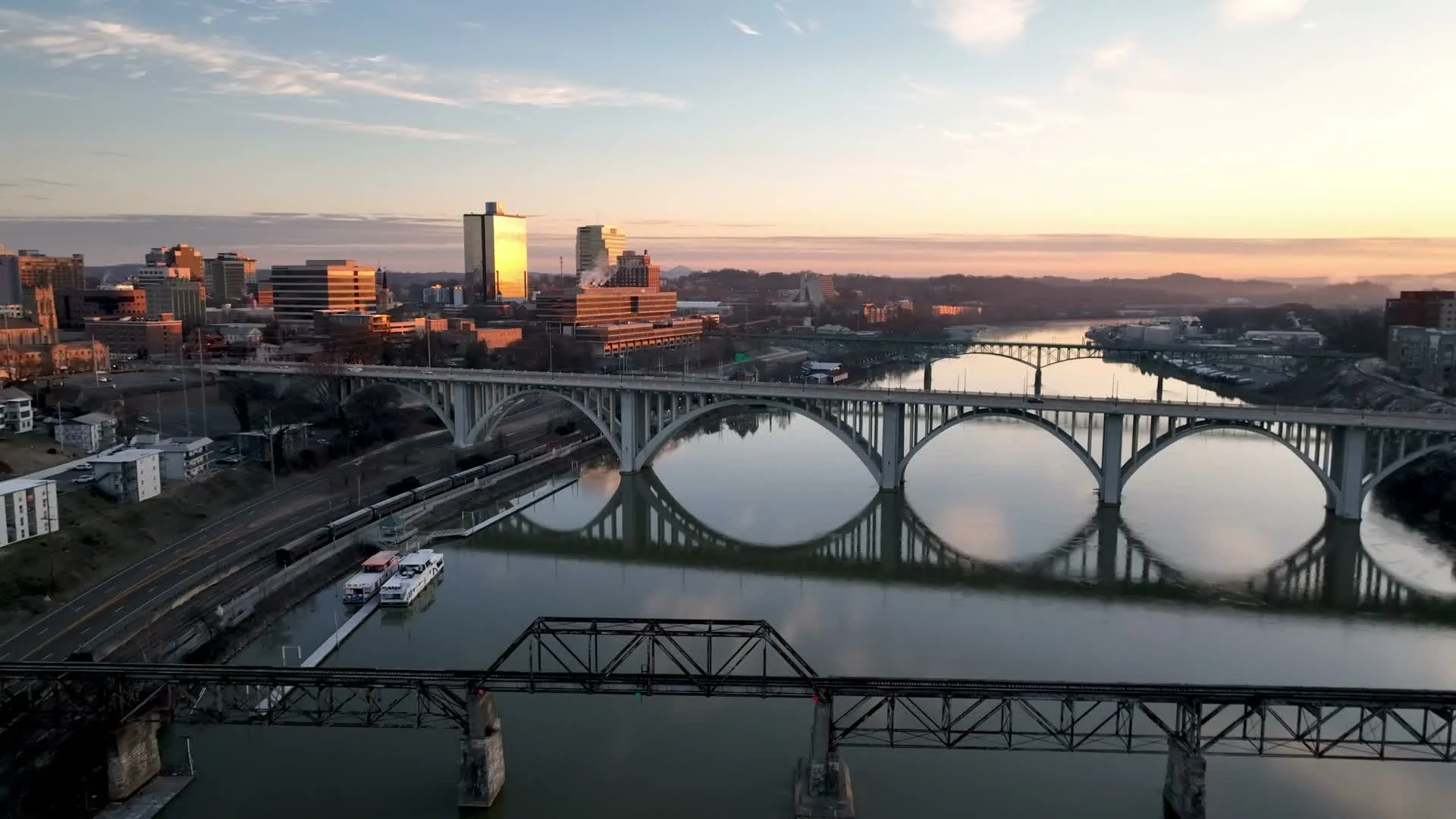 The Tennessee River and Knoxville skyline at sunset